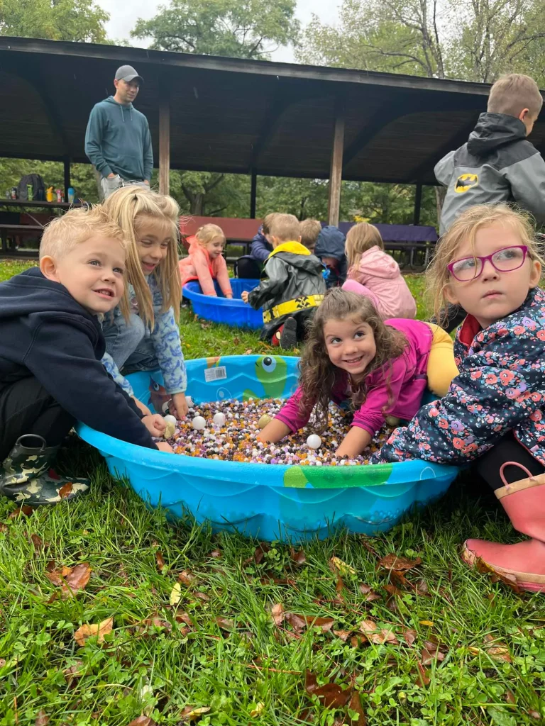 Children play outside at Jefferson Defrees Family Center